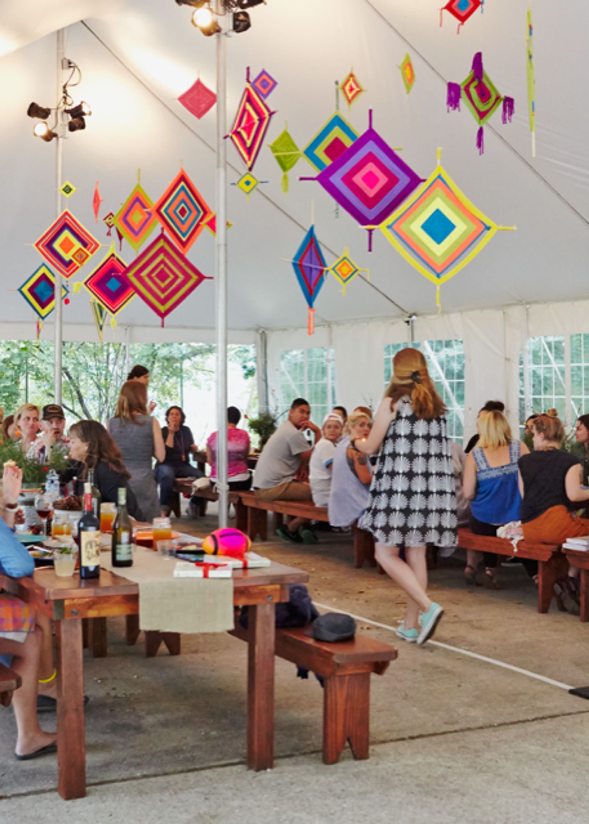 A marquee with colorful hanging mobils