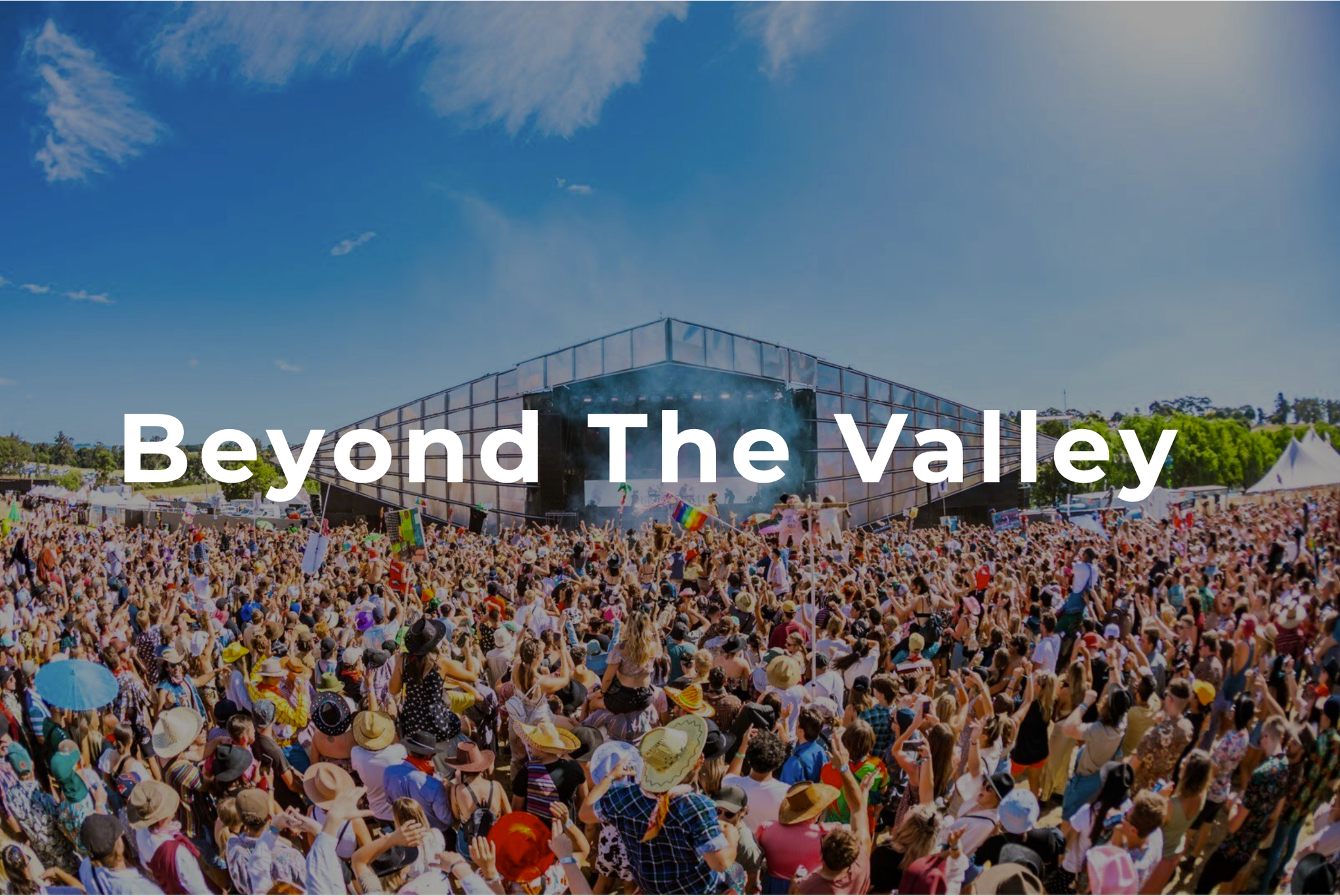 Beyond The Valley text overlaid across a photo of a crowd of festival goers