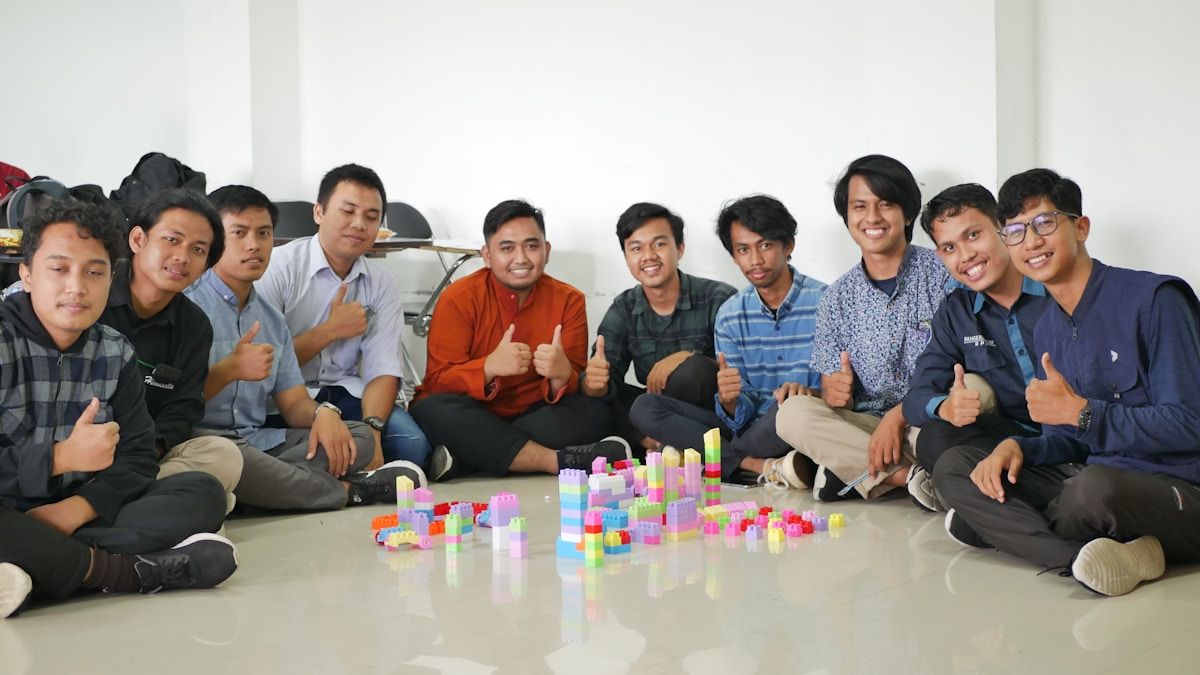 a group of men sitting next to each other