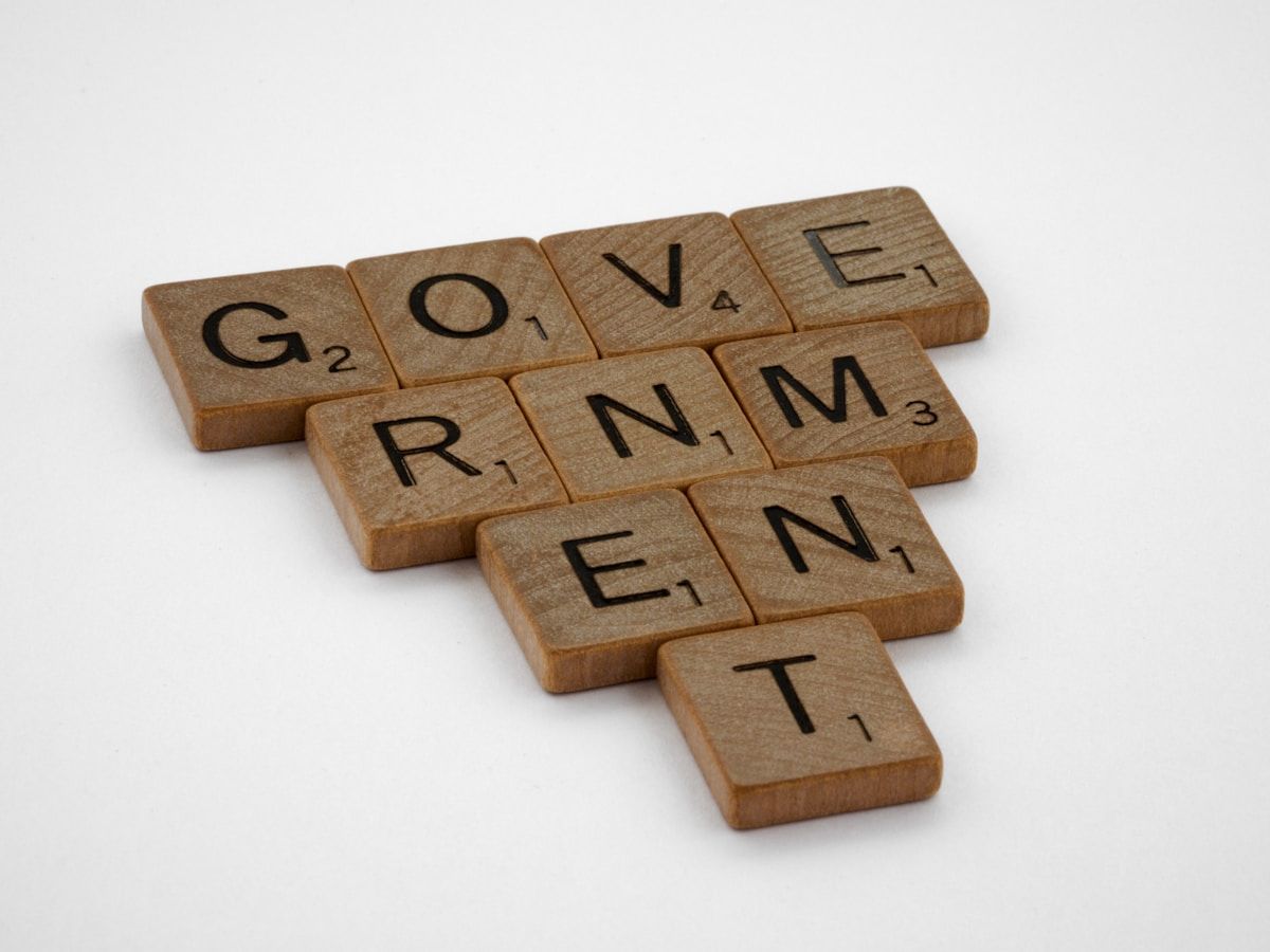 brown wooden letter t-letter