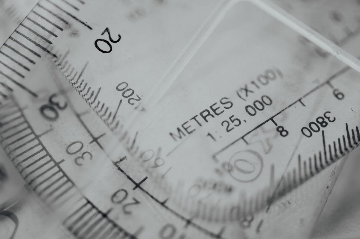 white and black analog gauge