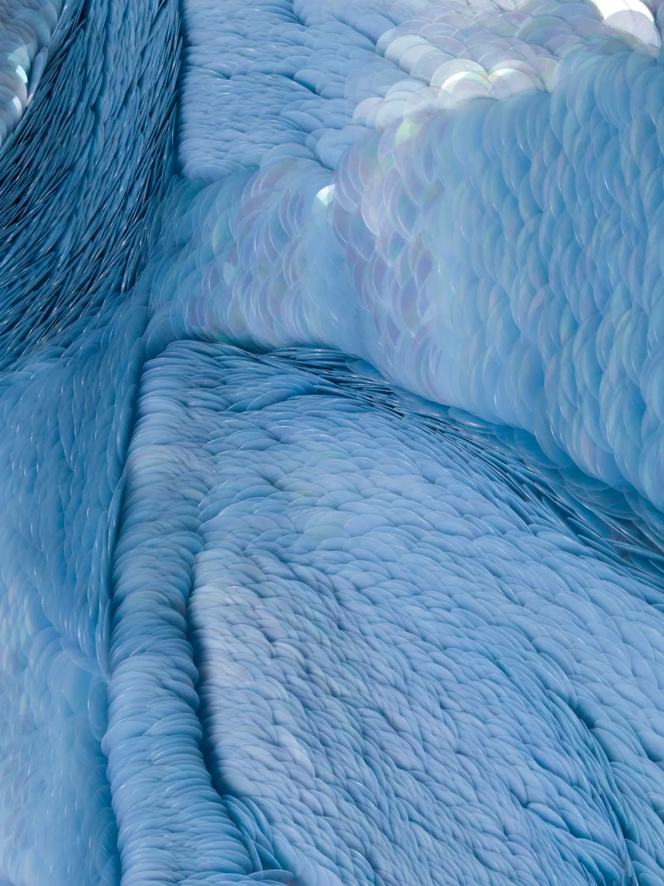 Blue sculptural SIMKHAI textile detail