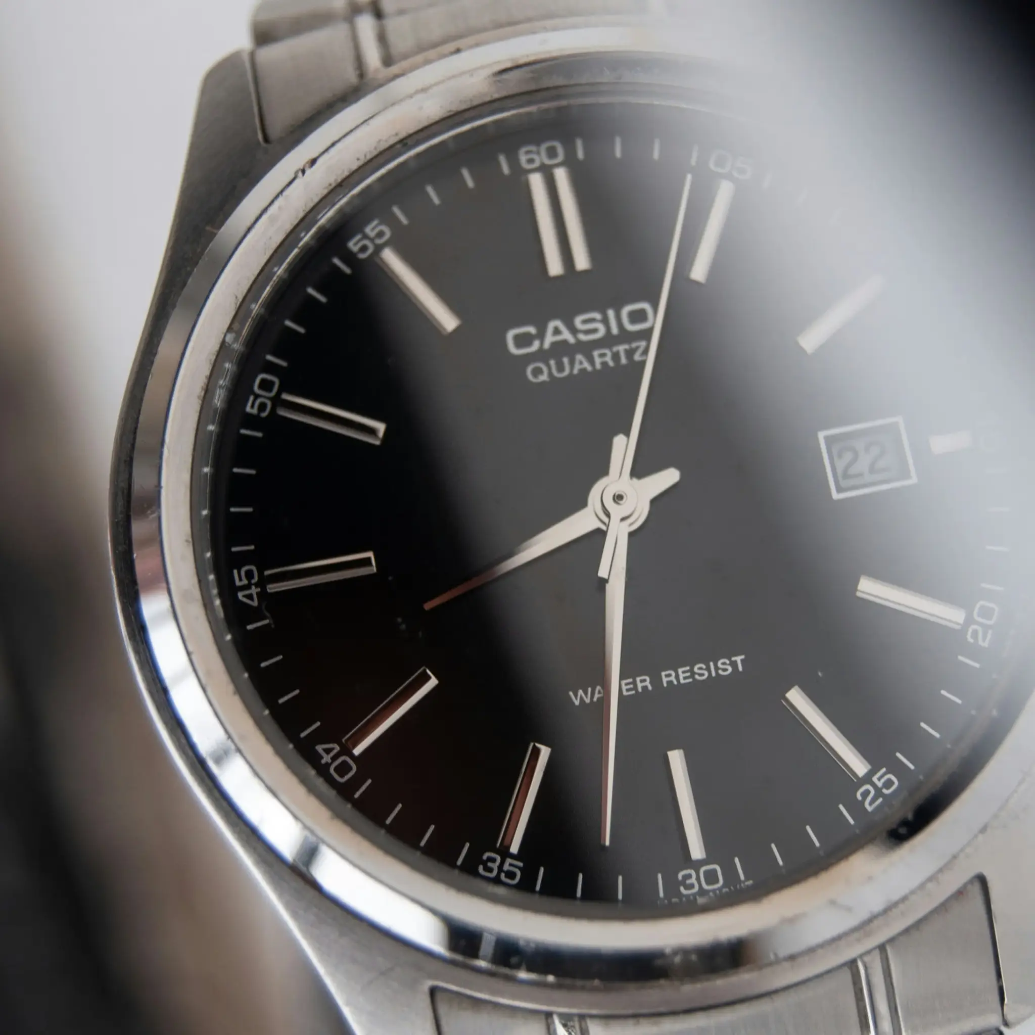 Close-up of an analog watch representing time saved by agentic commerce.