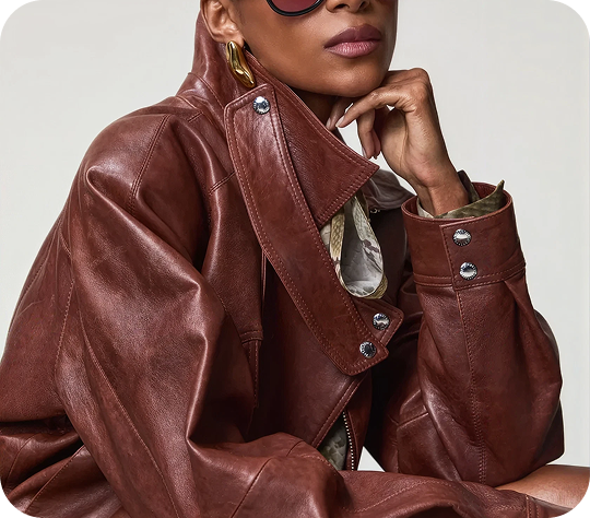 Model wearing leather coat