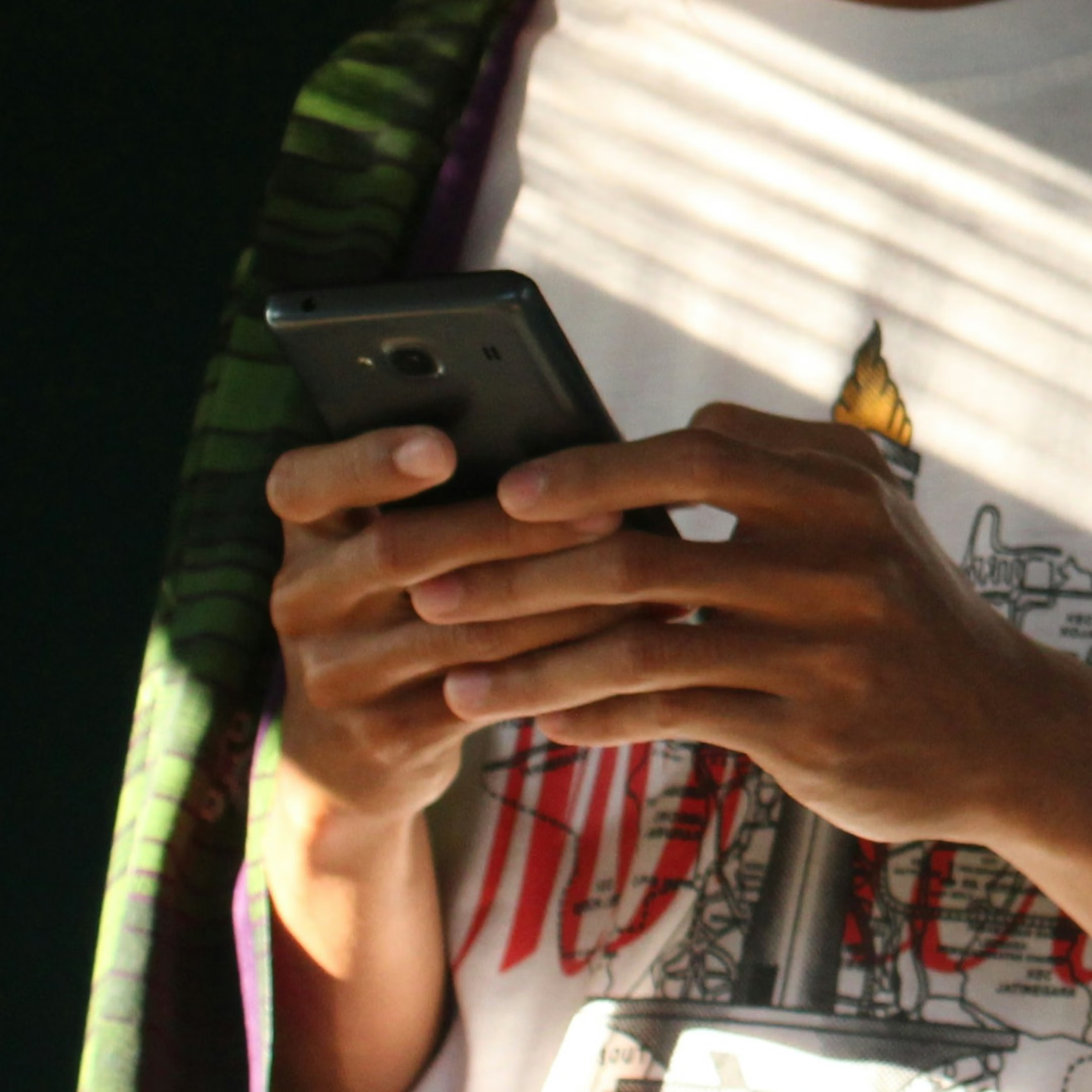 close up of hands on a cellphone