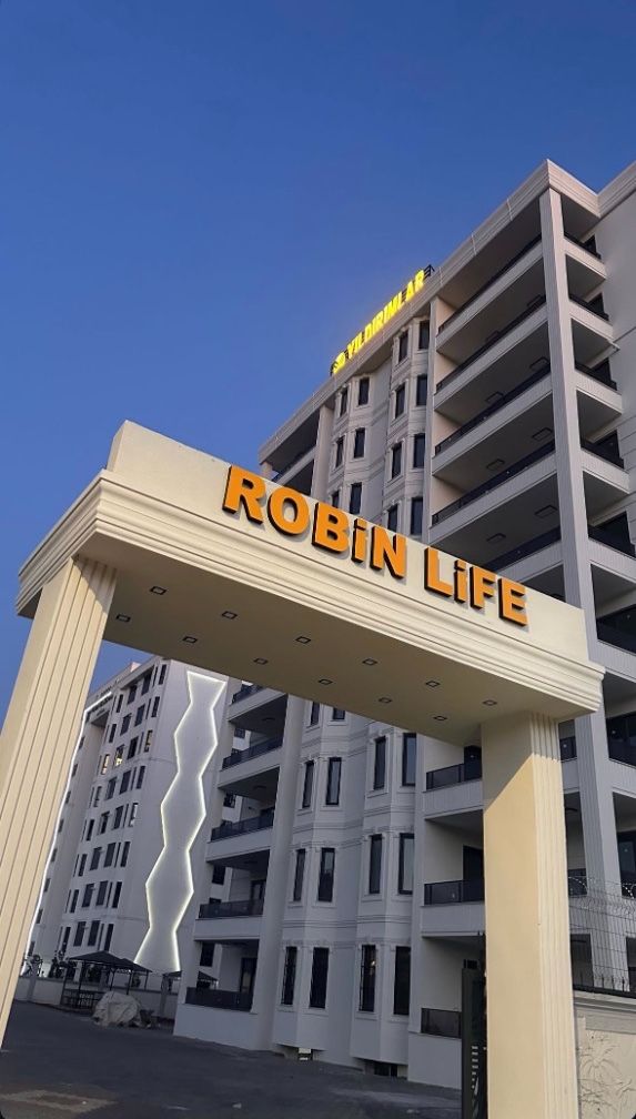 ROBIN LIFE giriş takı ve konut bloğunun gerçek fotoğrafı