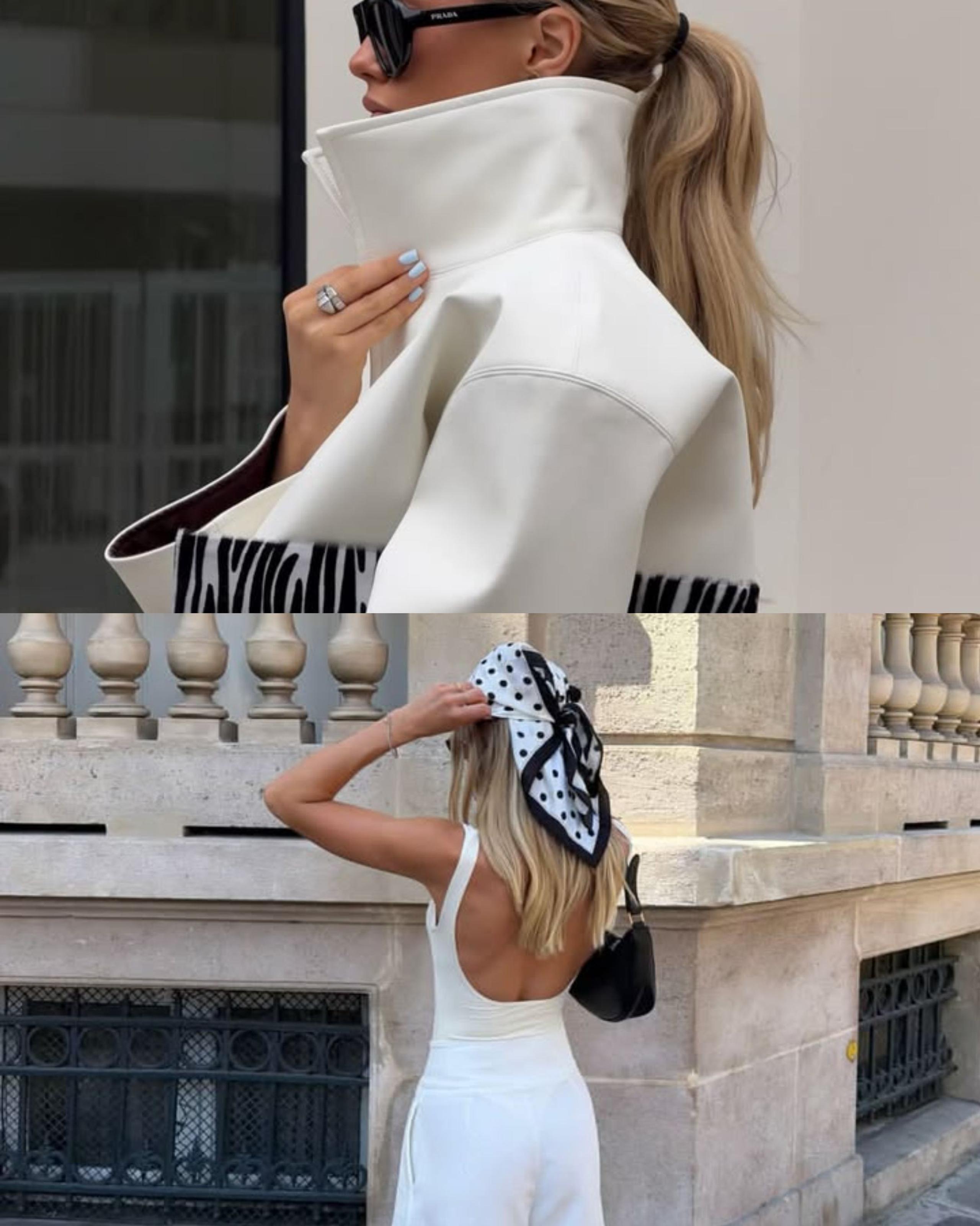 White leather jacket with a zebra clutch and a polka-dot headscarf