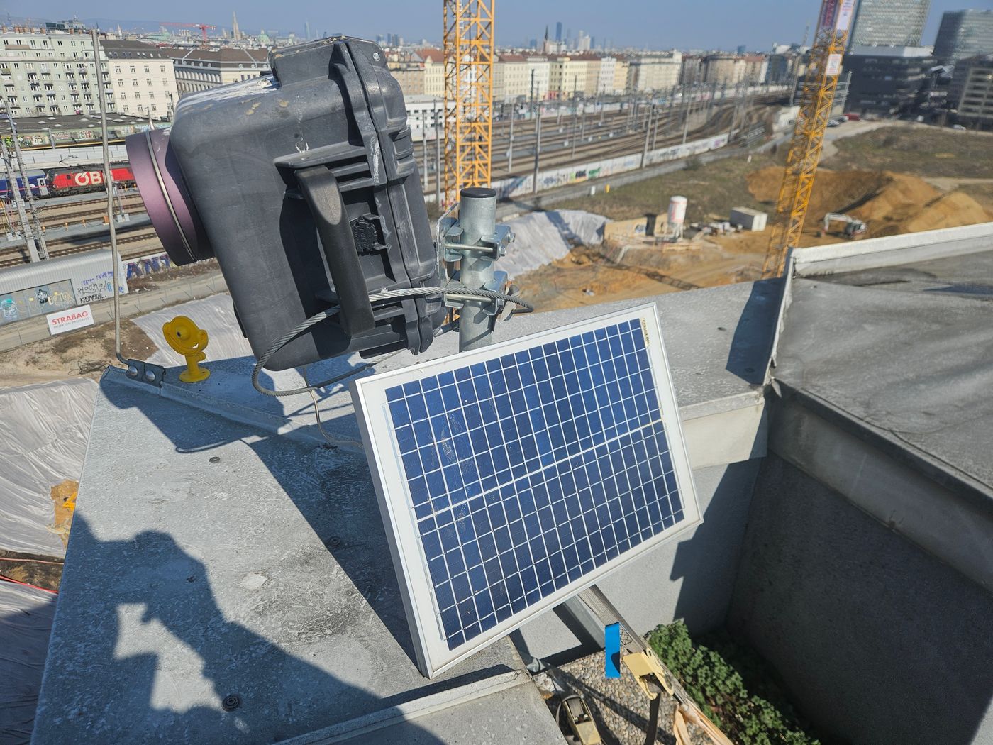 A construction camera powered by a solar panel