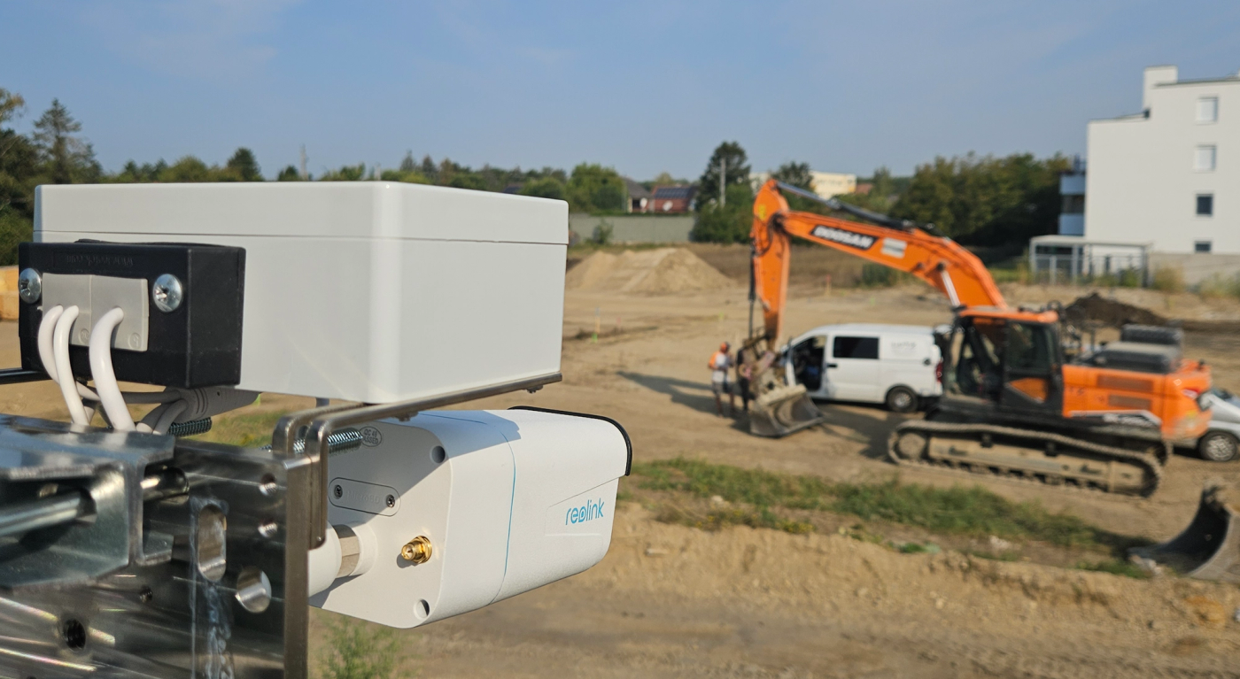 IP camera monitoring an active construction site with heavy equipment