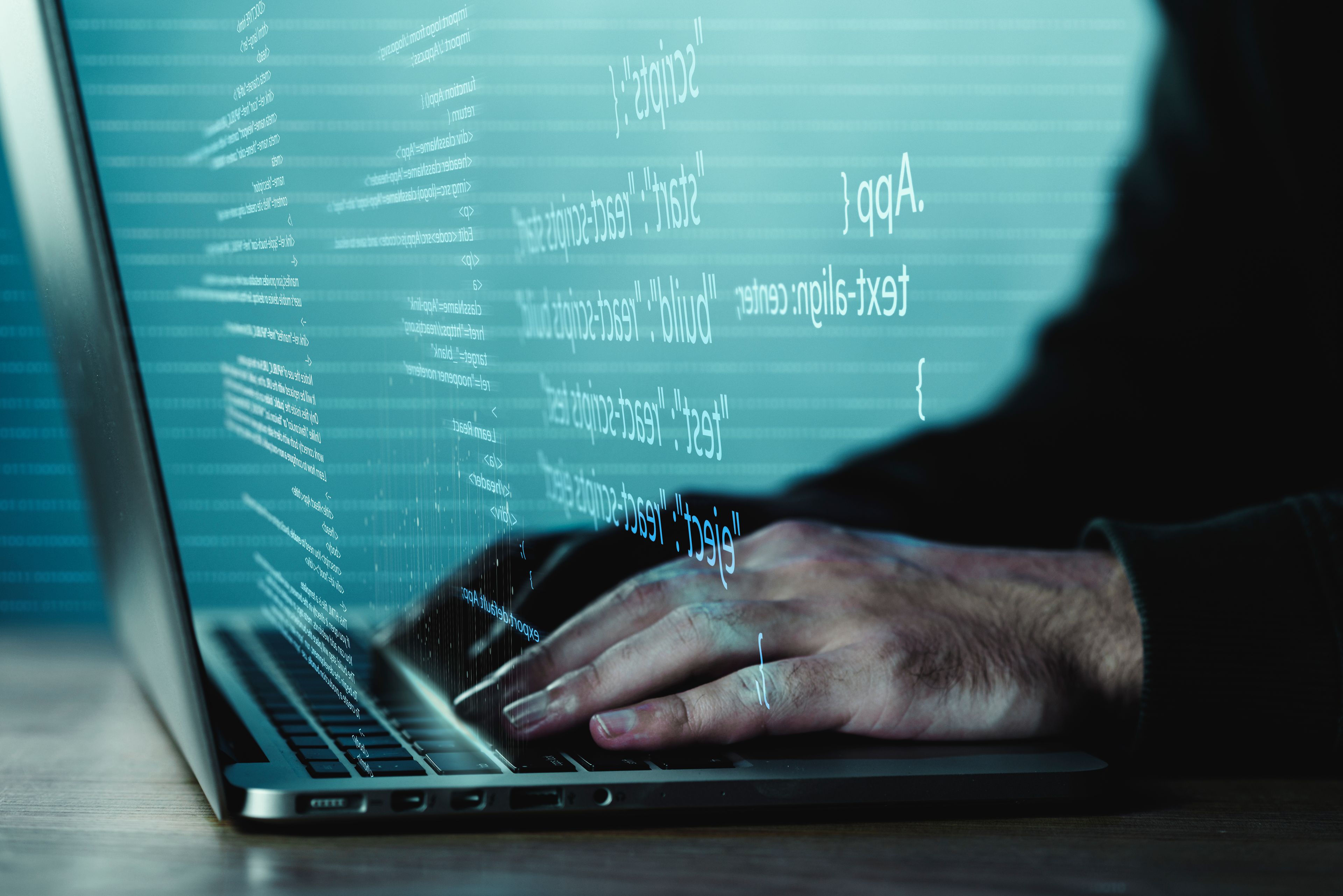 programming-background-with-person-working-with-codes-computer