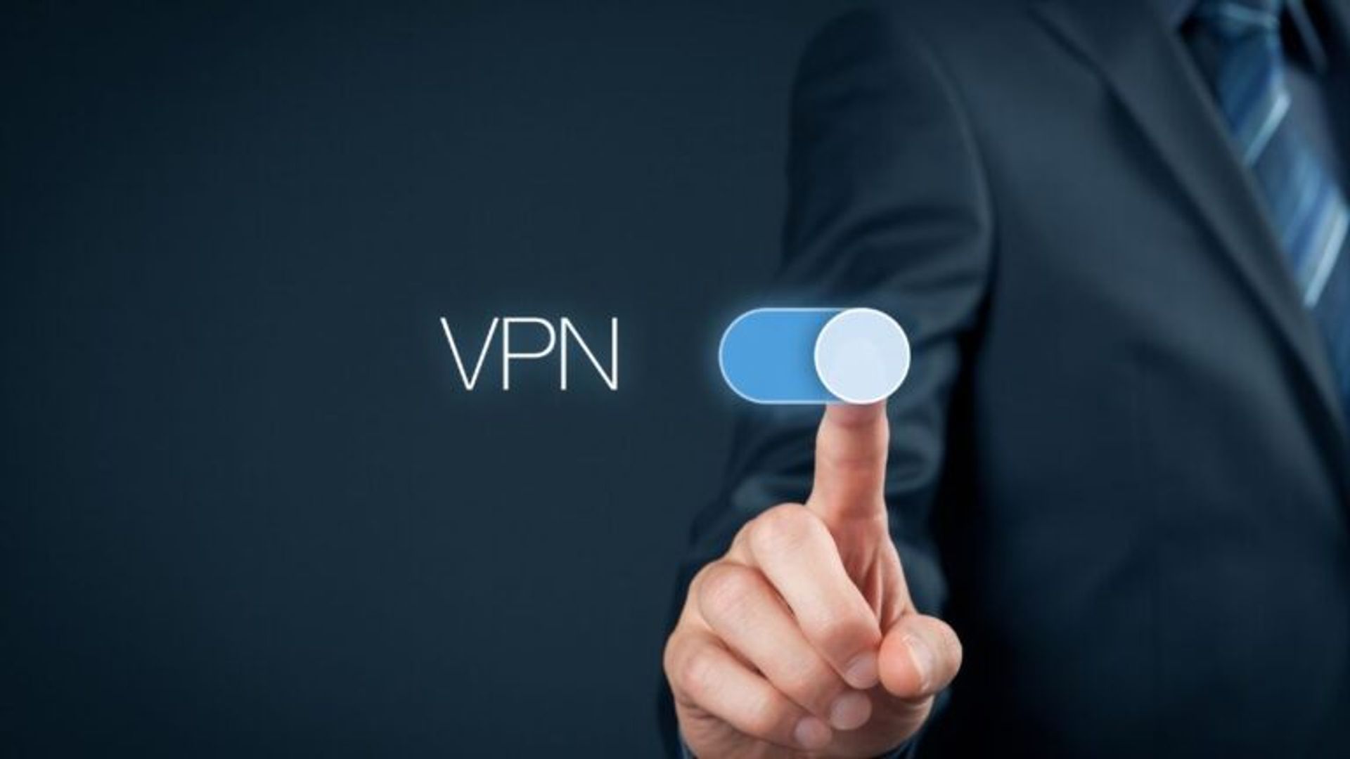 A hand in a suit activating a virtual VPN toggle switch.