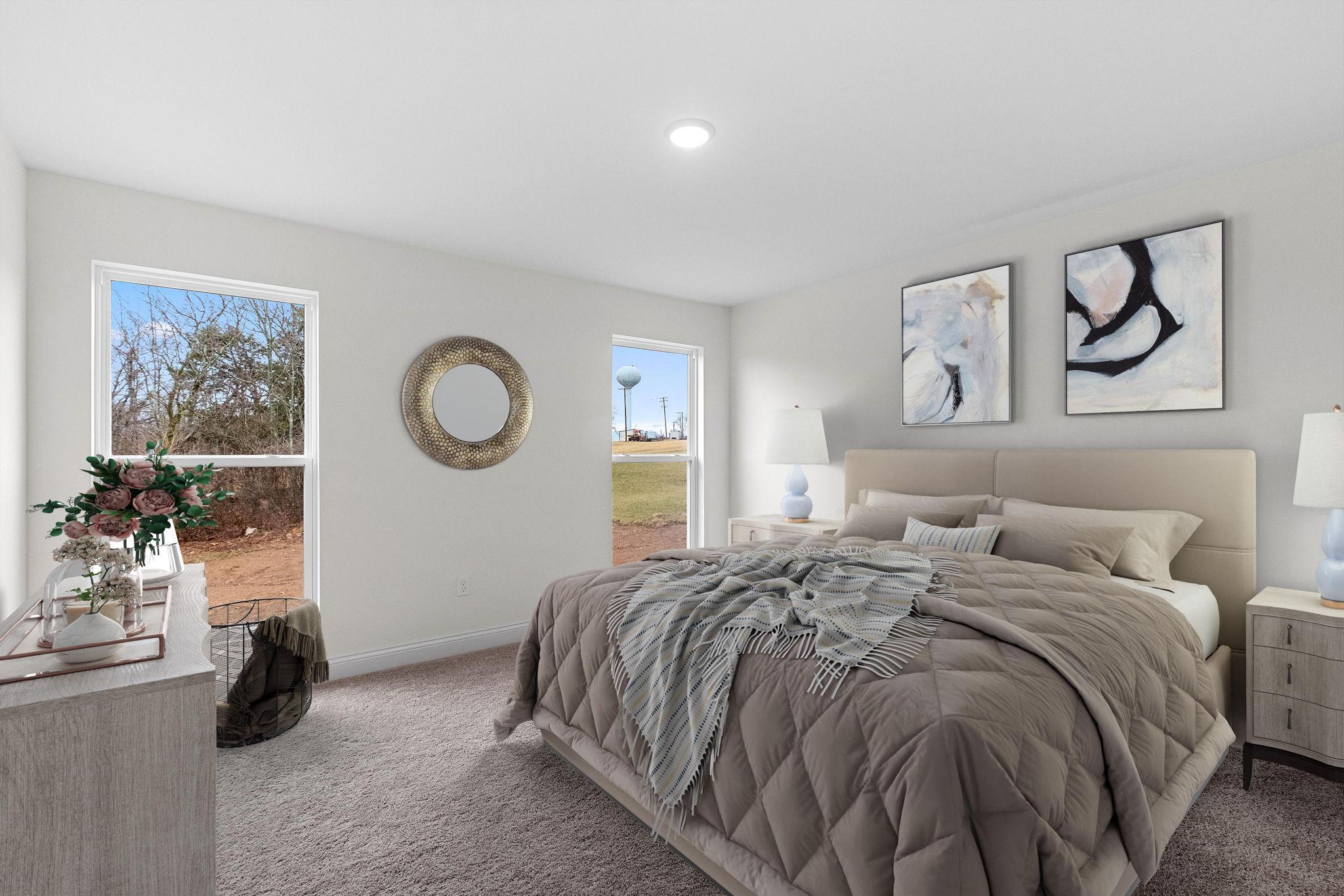 A stylish bedroom furnished with a comfortable bed, dresser and bedside tables.