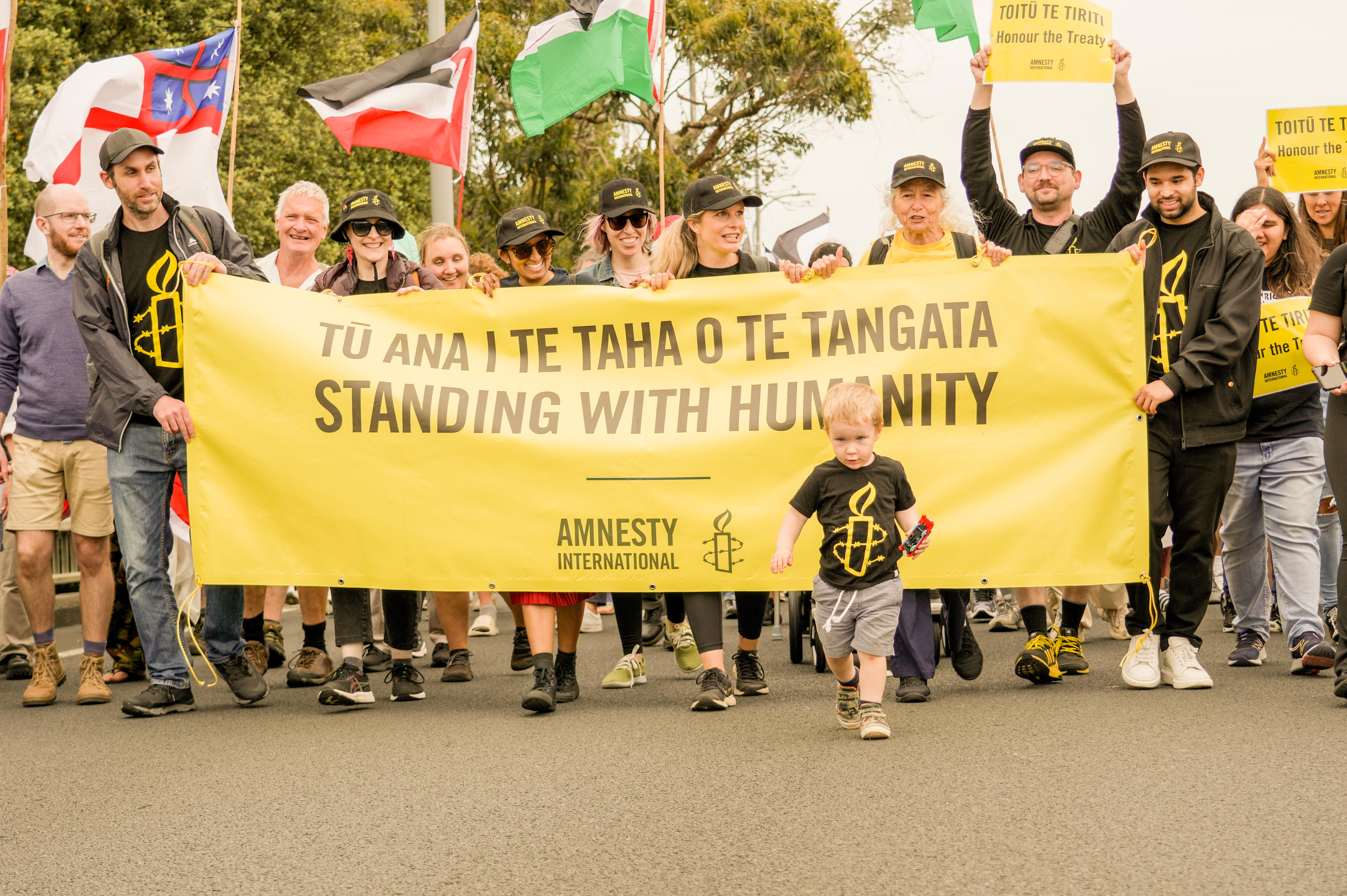 people with a banner