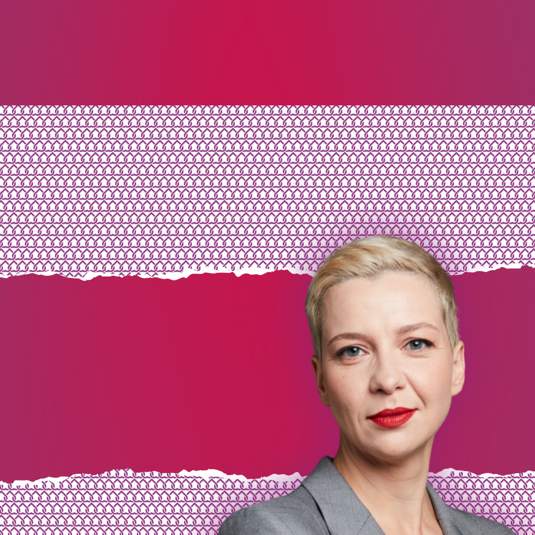 Maryia Kalesnikava standing against a pink background