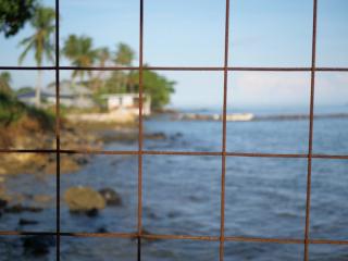 Nauru Island view through wire fence