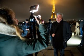 An Amnesty spokesperson is interviewed in France