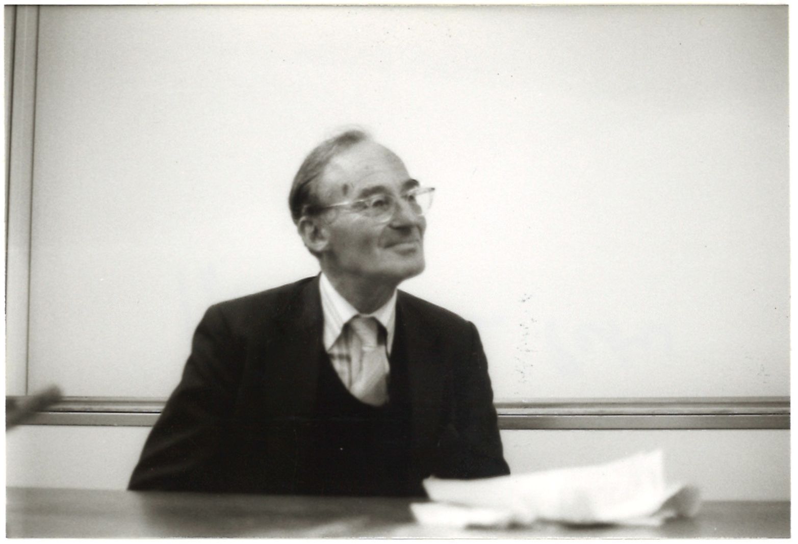 Amnesty founder Peter Benenson smiles in a classroom