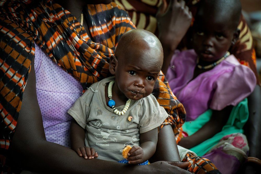 Sudanese child eating