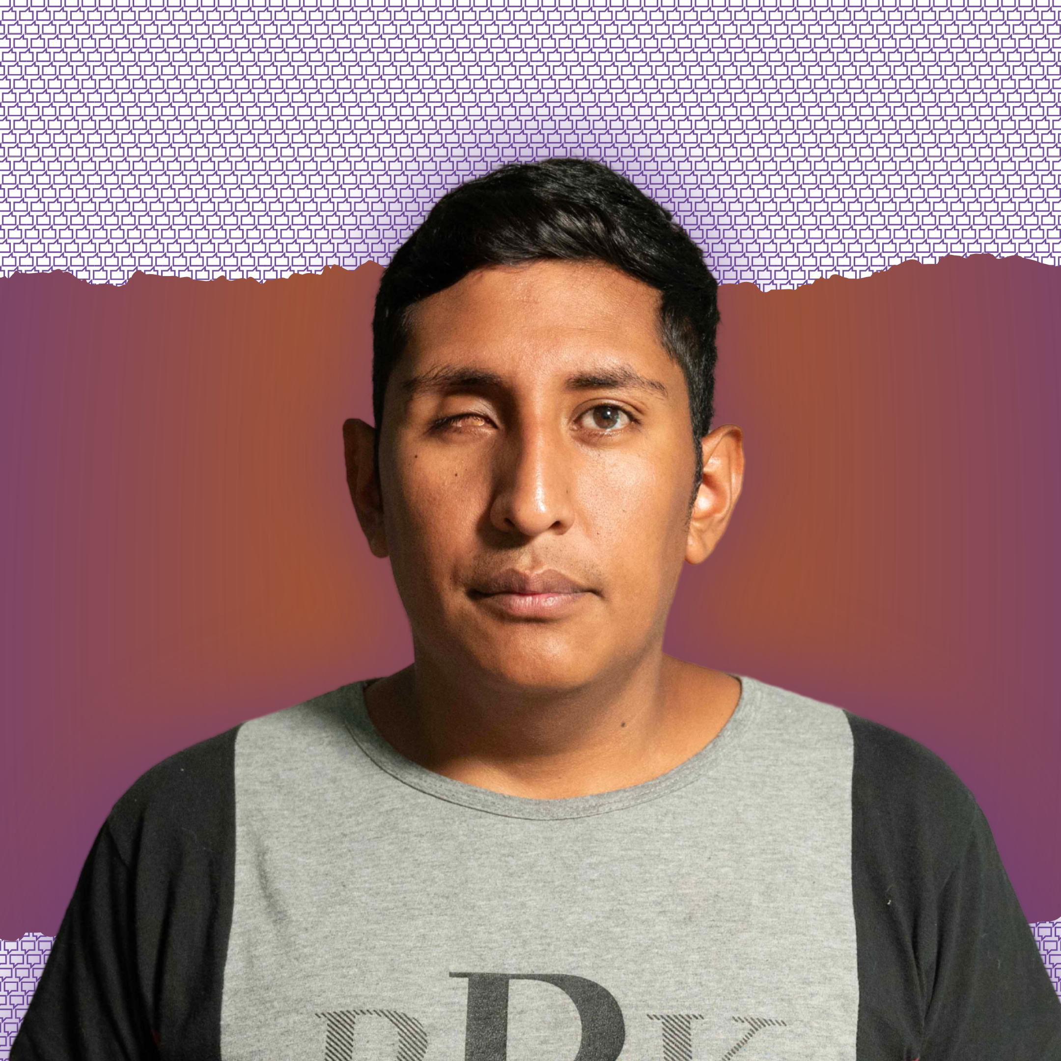 Joel Paredes standing in front of orange and purple background