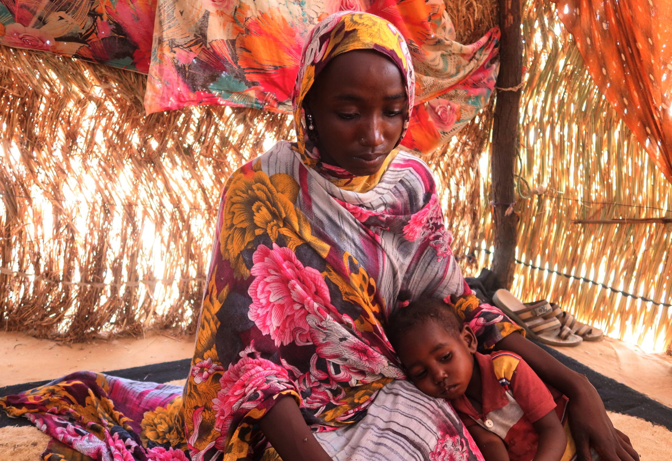 Photo of Sudanese woman with her child