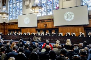  ICJ President Joan Donoghue (C) speaks at the International Court of Justice (ICJ) prior to the verdict announcement in the genocide case against Israel, brought by South Africa, in The Hague on January 26, 2024.