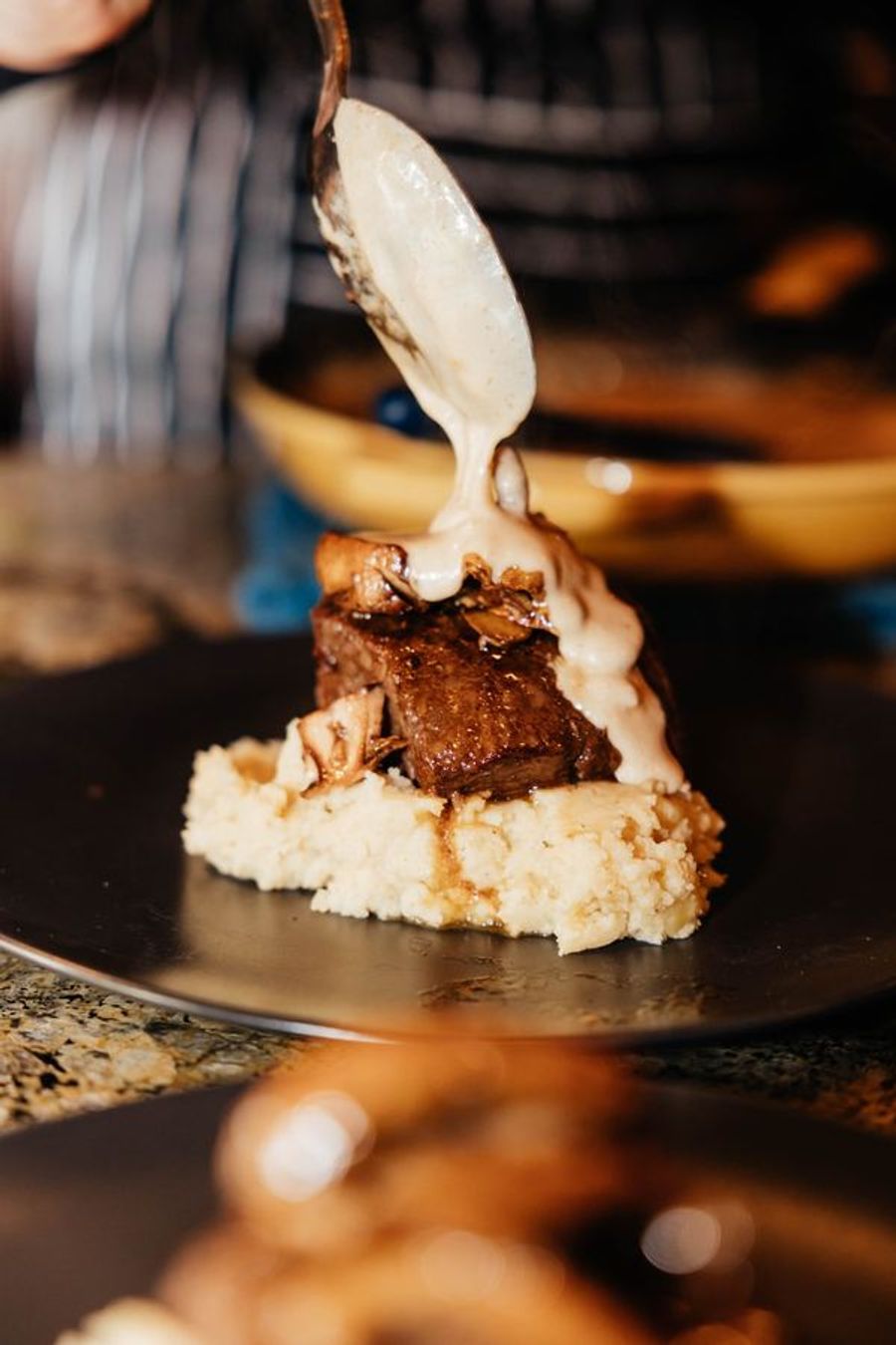 Sauce poured over a seared filet
