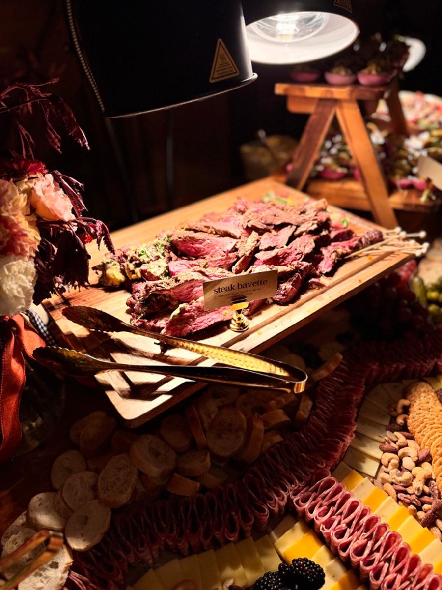 Steak bavette carving board beside the grazing table