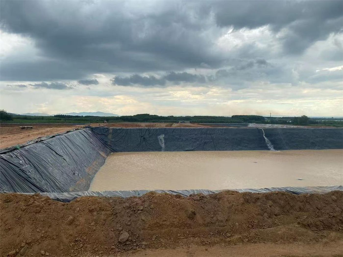 Anti-seepage project for fish breeding ponds