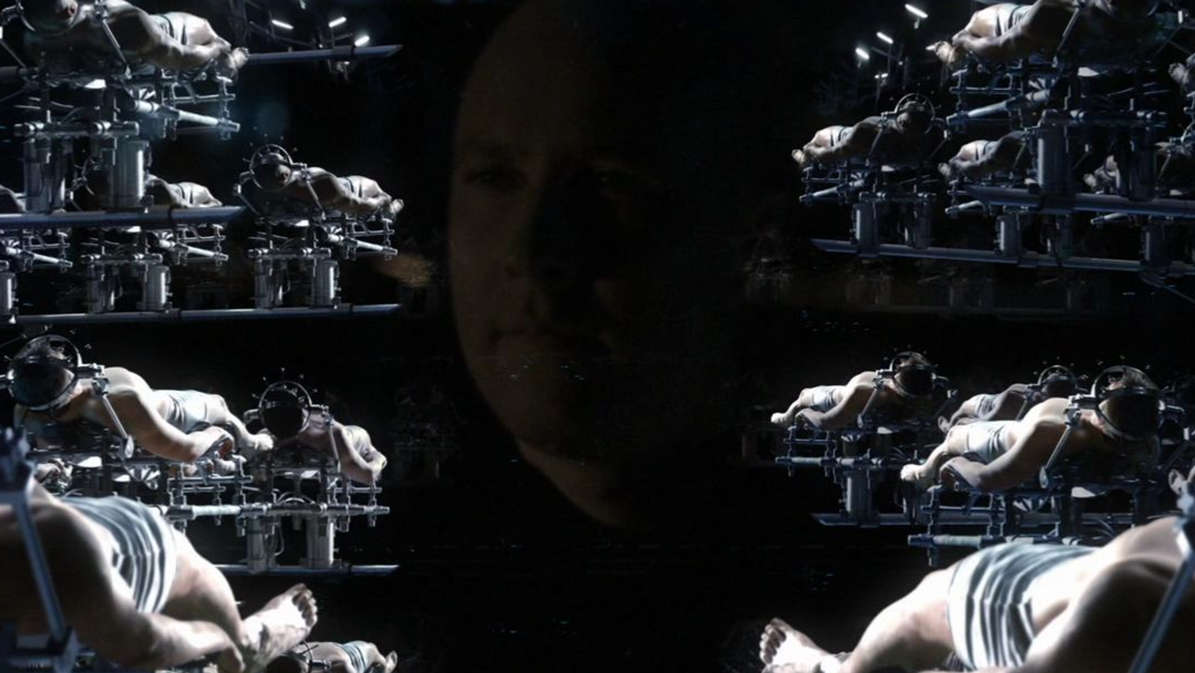 Lex Luthor looking at a batch of clones.