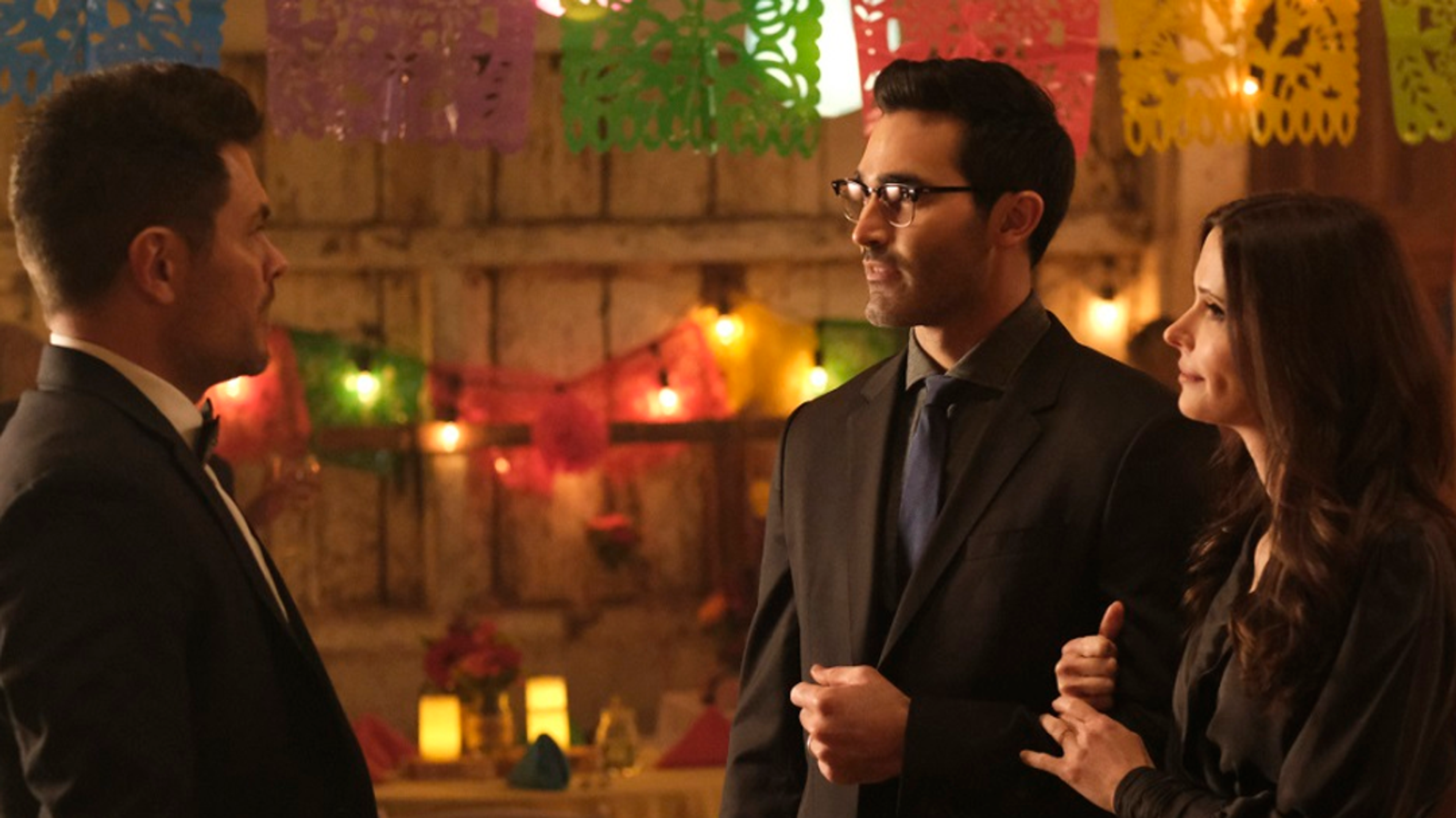 Clark, Lois, and Kyle are conversing at Sara's birthday party.