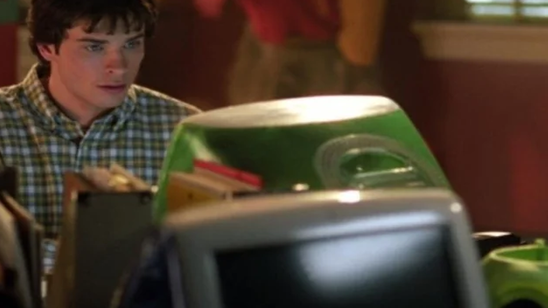 Clark Kent using an iMac.