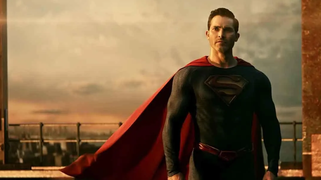 superman standing atop a building.