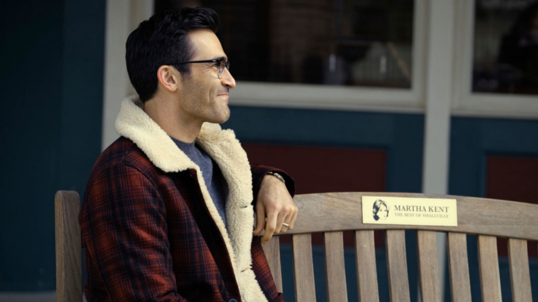 Clark sitting on a bench dedicated to Martha.