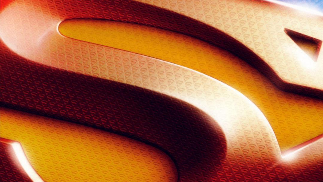 Promotional banner for the Superman Returns video game, a close up on the S shield.