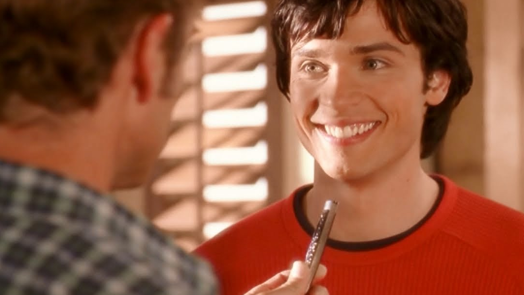 Clark Kent surpressing laughter.