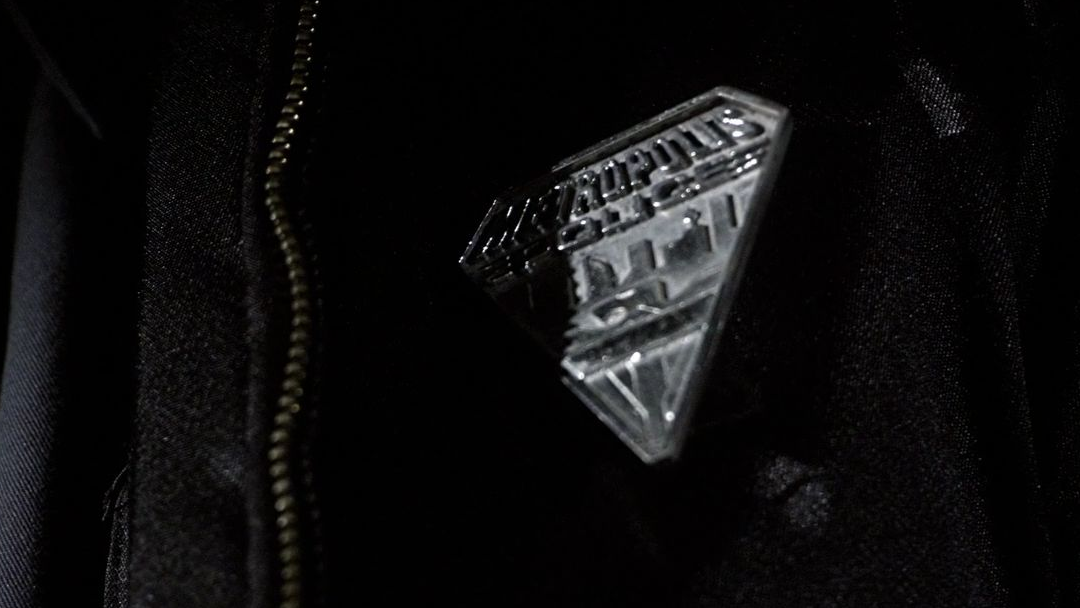 A Metropolis Police Department badge.