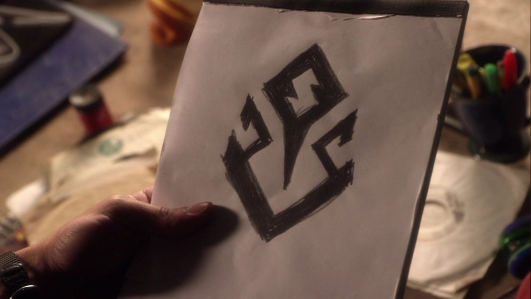 The Doomsday symbol scribbled on a notepad.