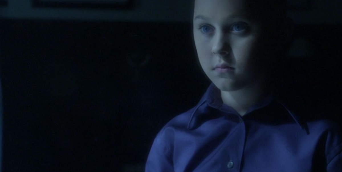 The young Lex clone, who has shaved his head.