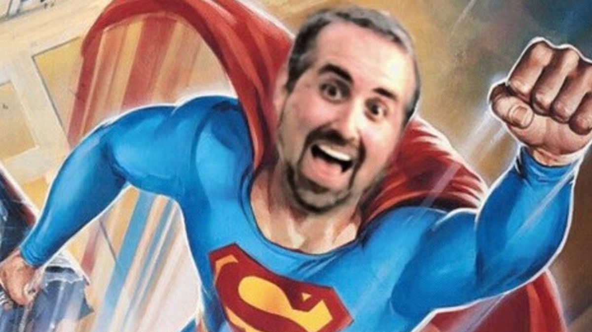 A man with a beard has comedically been edited onto the Superman IV poster.