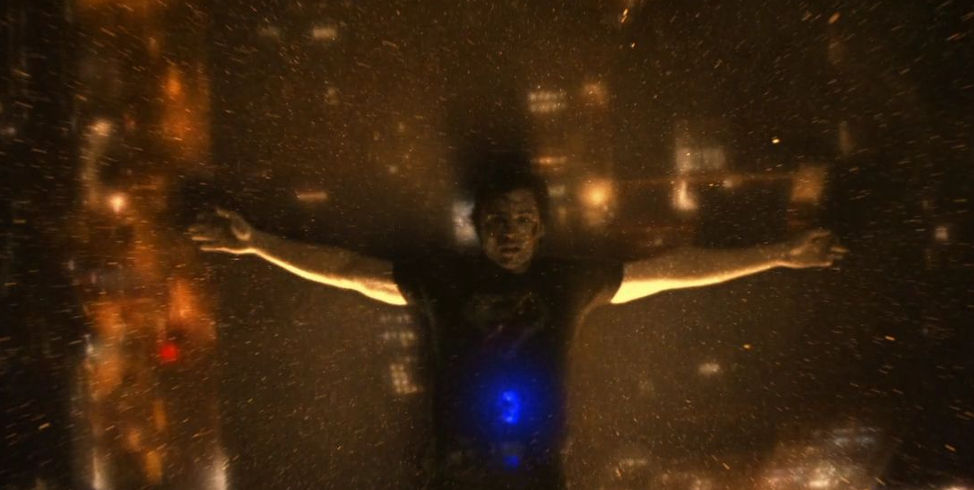 Clark falling after being stabbed with a blue kryptonite dagger.