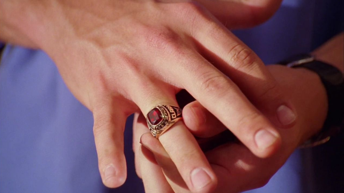 a red kryptonite class ring.