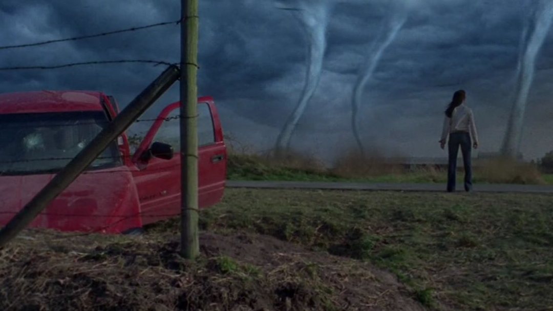 Lana Lang staring down three tornadoes.