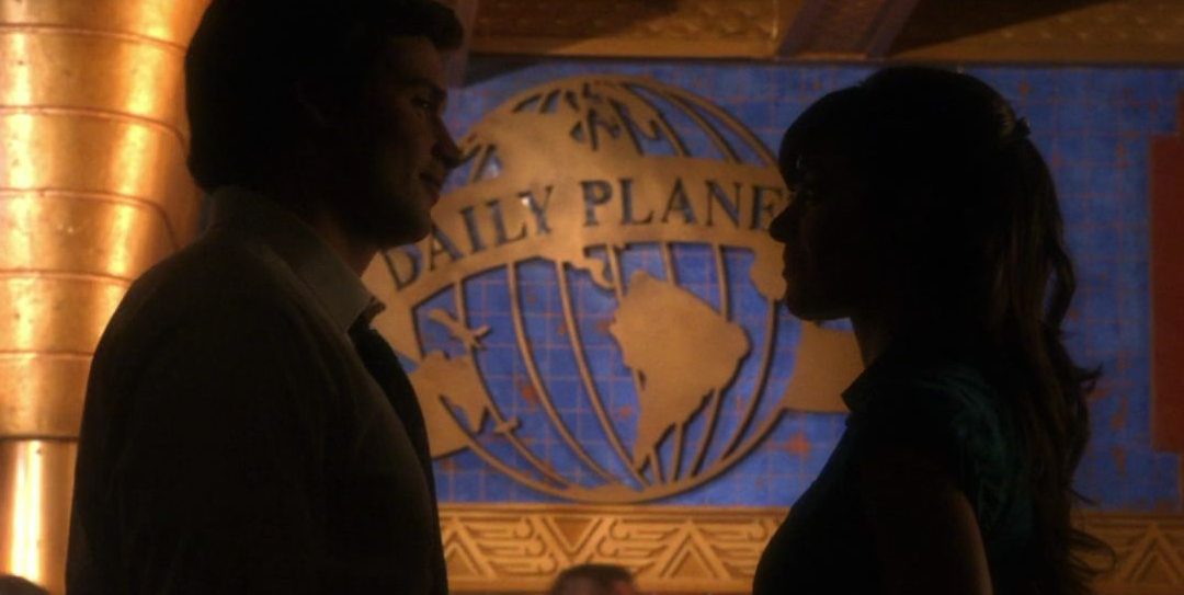 Clark and Lois in silhouette.