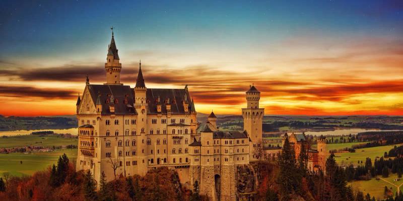 Neuschwanstein Castle on a forested hilltop in Bavaria, Germany