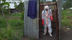 Ebola deaths near 2,000 as WHO concedes the outbreak is outrunning the response