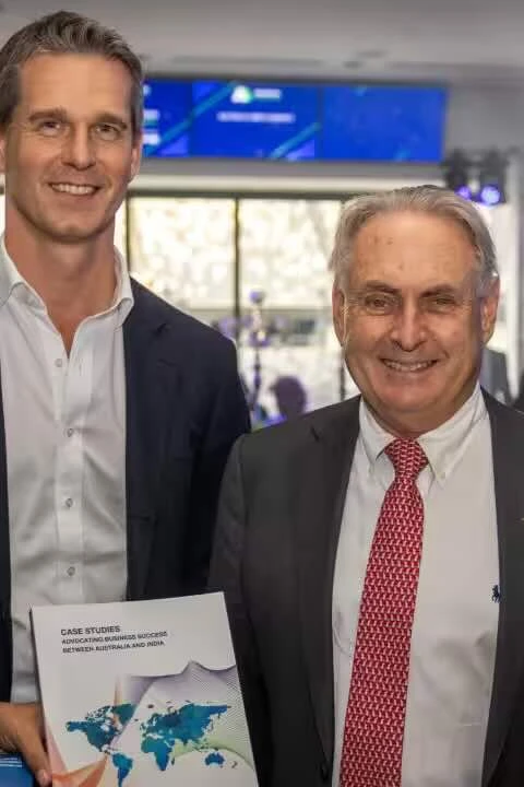 (L-R) Newland Global CEO Dipen Rughani, MP for Parramatta Dr Andrew Charlton, Minister for Trade Don Farrell and Newland Global Executive Director Natasha Jha Bhasker with the compendium "Case Studies: Advocating Business Success Between Australia and India"