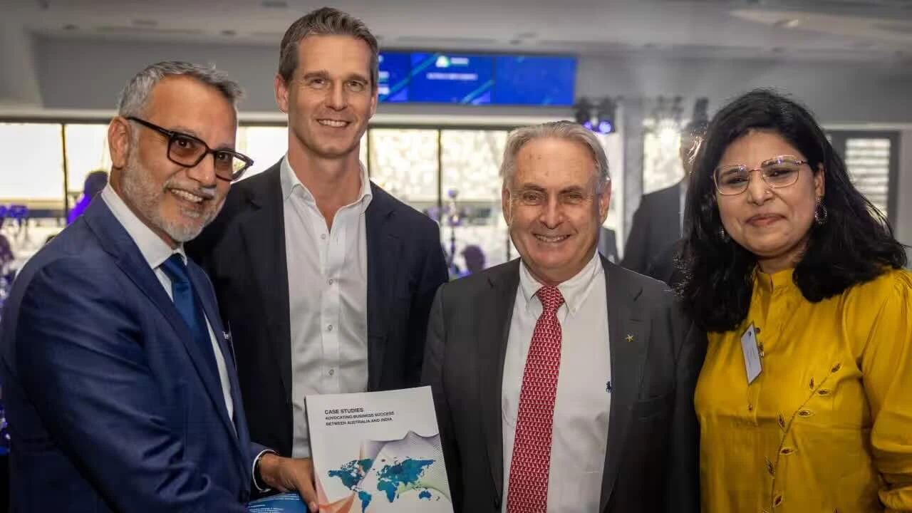 (L-R) Newland Global CEO Dipen Rughani, MP for Parramatta Dr Andrew Charlton, Minister for Trade Don Farrell and Newland Global Executive Director Natasha Jha Bhasker with the compendium "Case Studies: Advocating Business Success Between Australia and India"