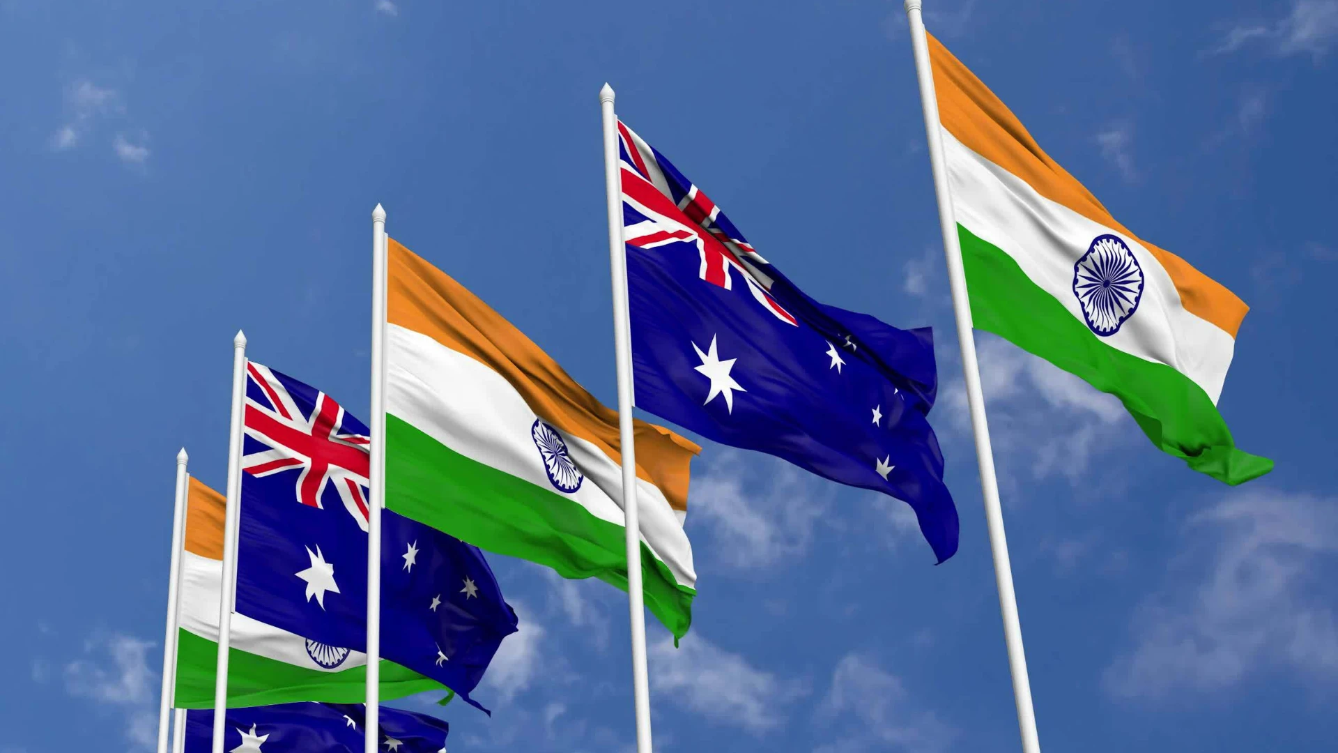Australian and Indian multiple flags at a summit or international event