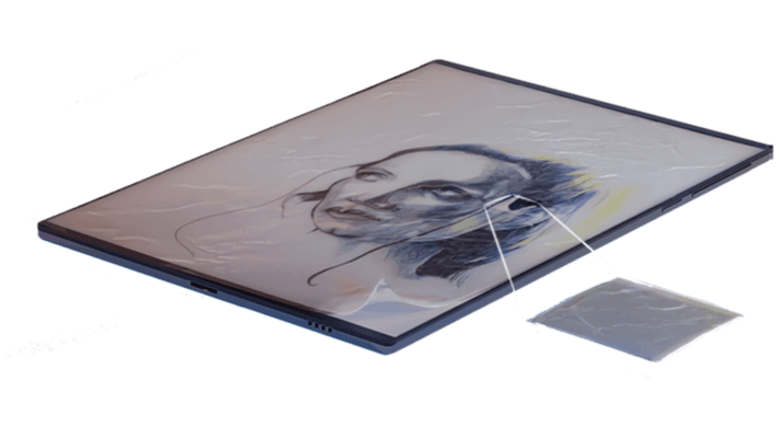 A tablet displaying a drawing beside a sheet of HaptonTech haptic coating film