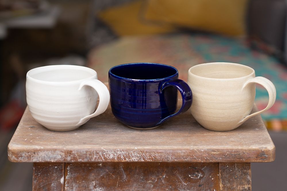 Three cups in different colours